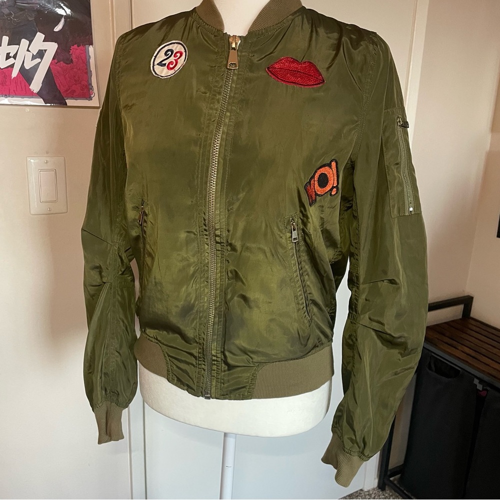 Patches patch covered green satin jacket